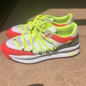 Vibrant Athletic Sneakers with Neon Accents puma lace rider